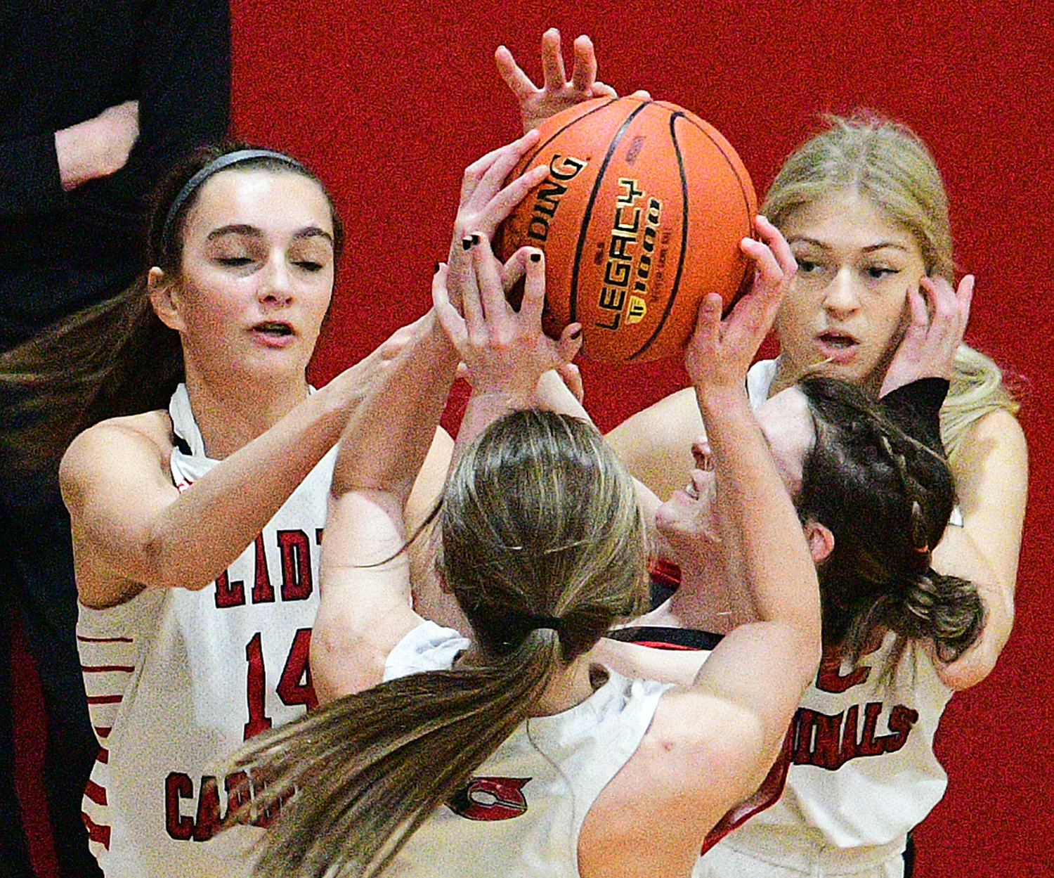 CHADWICK’S LEXI LOVELAND, CORA MICHAEL AND RAELEIGH LITTLE surround a Niangua ball-handler at Districts.