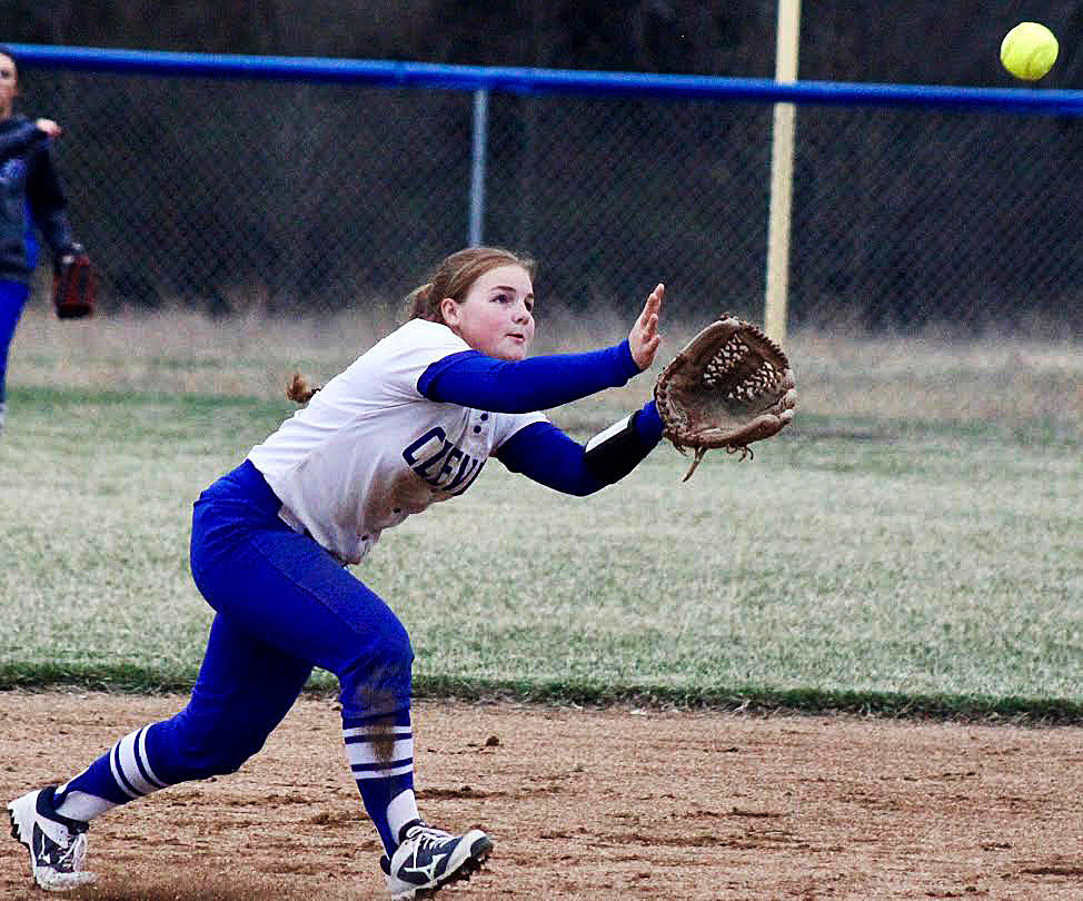 RYLEE KING camps under a fly ball at second base.