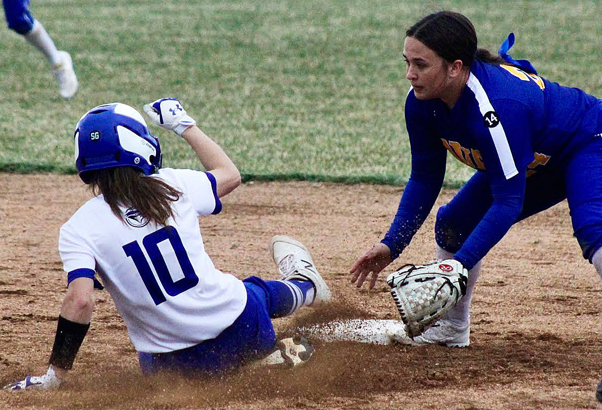 KYLIE WENGER steals second base.
