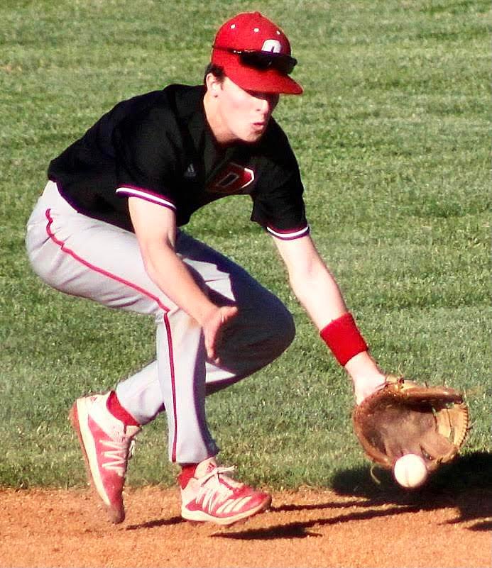 BRADY DODD ranges to his left for a grounder.