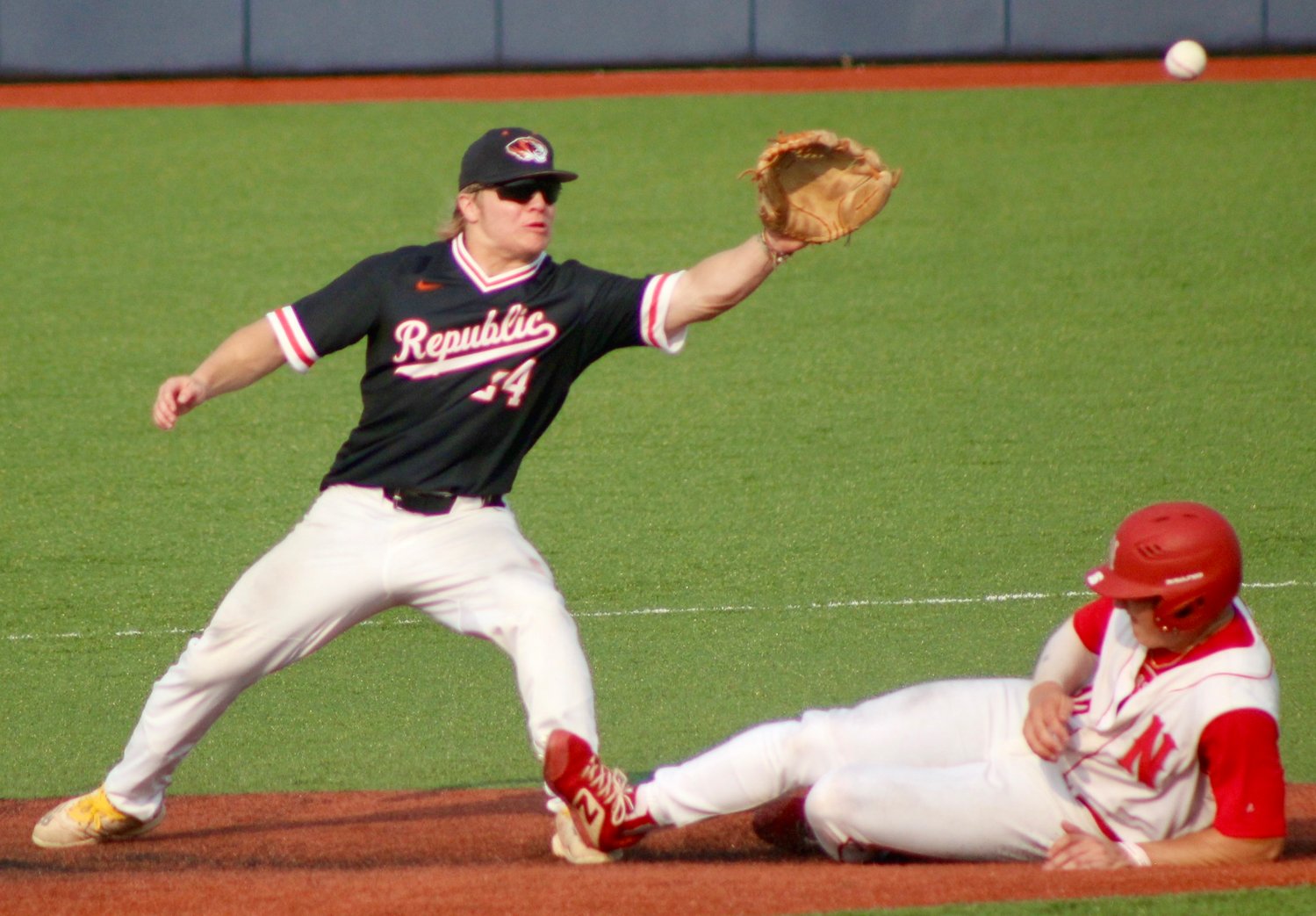 NIXA'S TANNER GRANT looks to steal second base.
