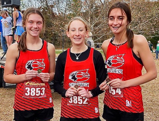 CHADWICK'S RAELEIGH LITTLE, GRETCHEN HOUSE AND LEXI LOVELAND all placed in the top 34 at the Class 1 State Cross Country Meet.