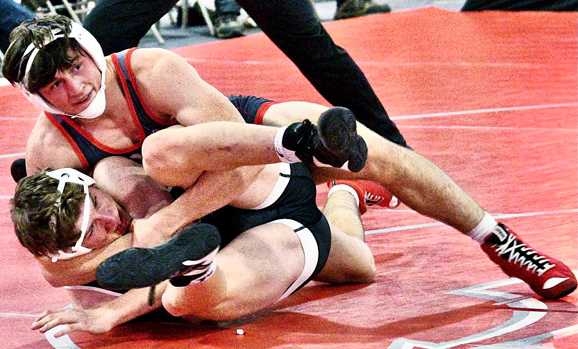 NIXA'S NATE BROWER gains control of his opponent at 175 pounds Friday.