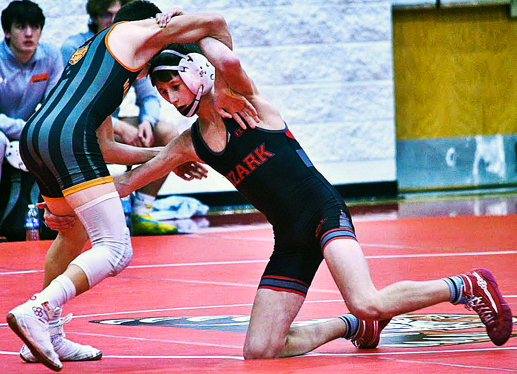OZARK'S TEAGON PATTERSON competes at 113 pounds against Waynesville on Tuesday.