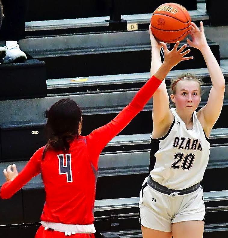 OZARK'S MOLLY RUSHING looks to make a pass.