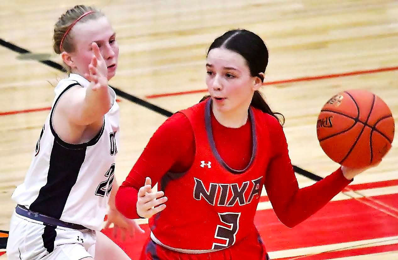 NIXA'S LILY MAHY gets set to make a pass.