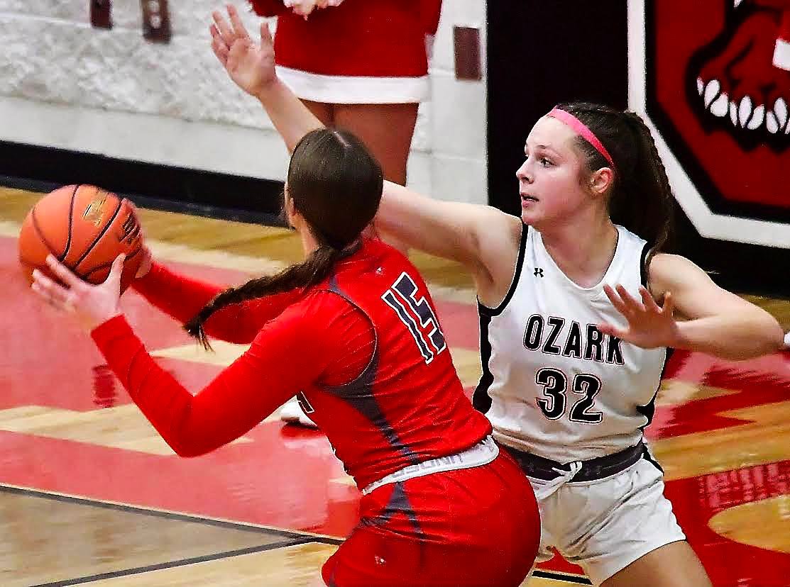 OZARK'S ALEXIS SOLOMAN applies defense.