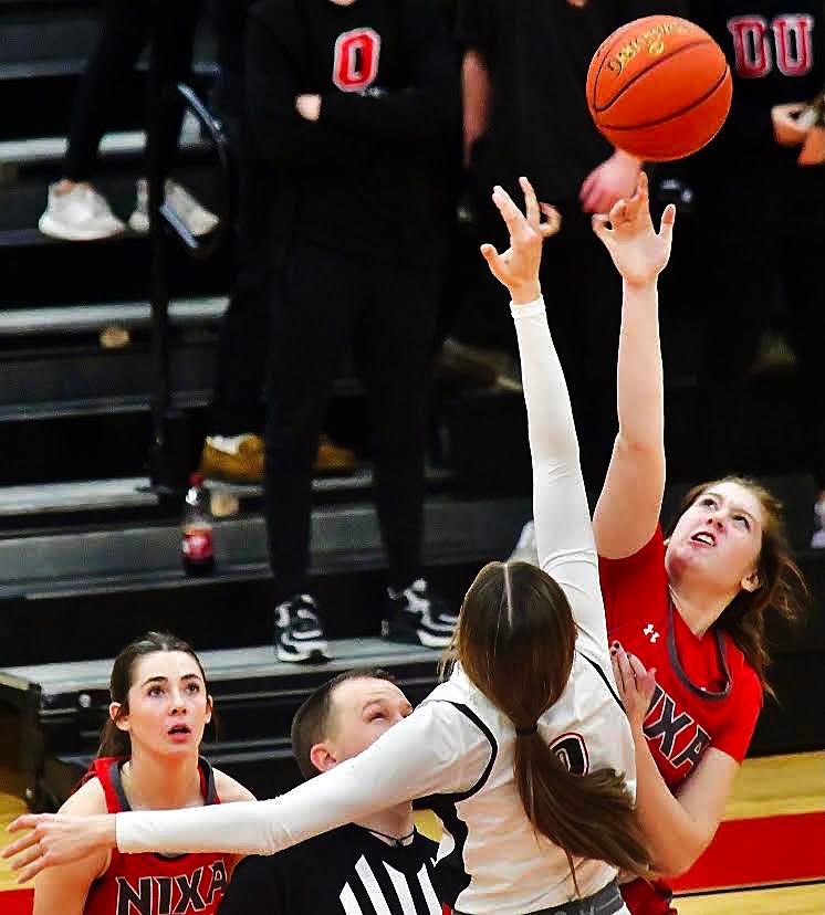 NIXA'S NORAH CLARK wins the tip to start overtime.