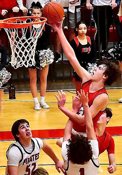 OZARK'S COHEN GEORGE scores two of his eight points.