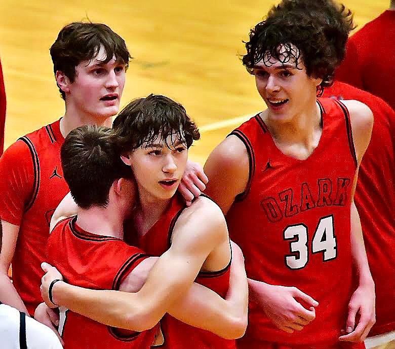 OZARK'S HUDSON ROBERTS receives a hug from Ethan Sutherland.