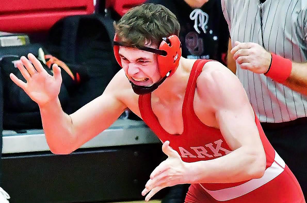 OZARK'S JOHNNY WILLIAMS celebrates his semifinal win.