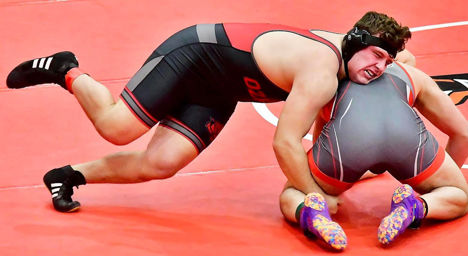 OZARK'S PEYTON GREER tries to roll his opponent.