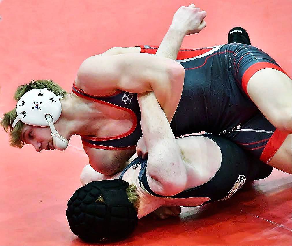 NIXA'S ZAN FUGITT dominates an opponent.
