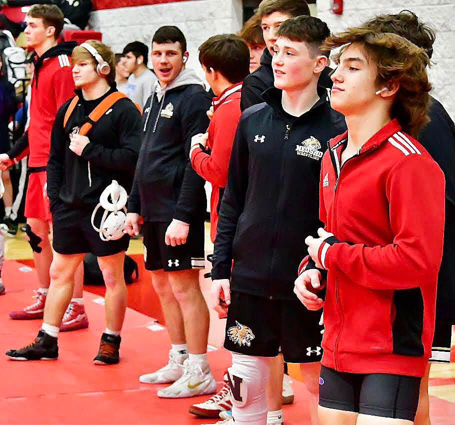 OZARK'S DAMIEN MOSELEY, BRAXTON STRICK AND JOHNNY WILLIAMS line up with other finalists prior to the Class 4 District 3 championship matches.