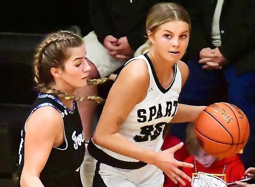 SPARTA' BRYNN HOLT and the Lady Trojans play host to the Class 3 District 11 semifinal round tonight.