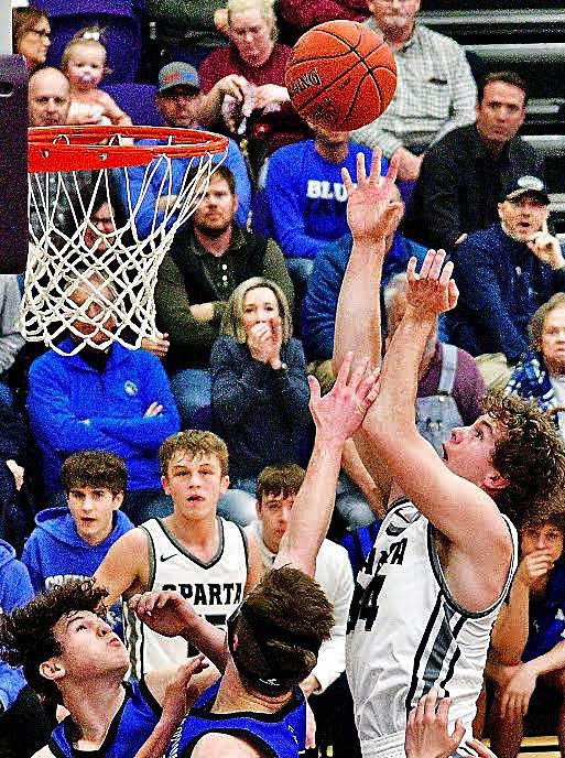 SPARTA'S JACOB LAFFERTY eyes a jumper in the paint.