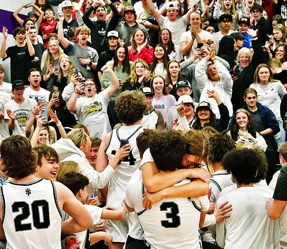 SPARTA PLAYERS AND FANS celebrate their District championship.
