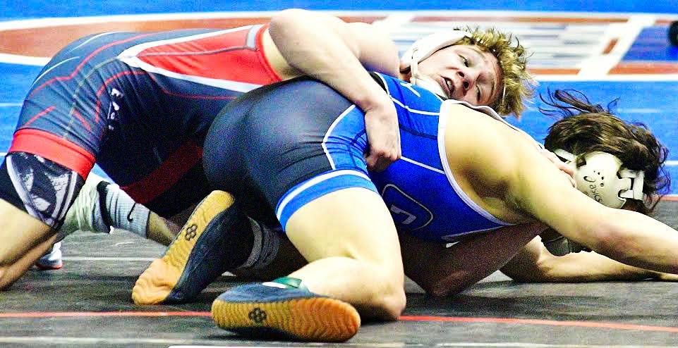 NIXA'S ZAN FUGITT works on top in a semifinal match at the State Wrestling Championships on Saturday.