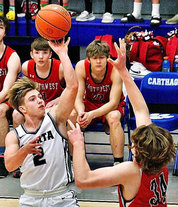 SPARTA'S WALKER LOVELAND takes a jumper.