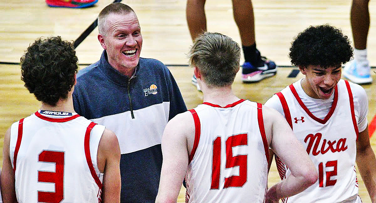 NIXA COACH BROCK BLANSIT is all smiles during the final seconds of Friday's Class 6 District 5 Nixa victory.