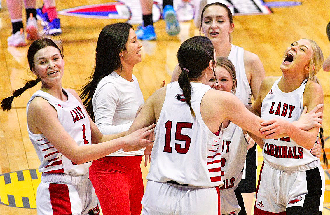 CHADWICK PLAYERS begin their celebration following the Lady Cardinals Class 1 Final Four semifinal win Thursday.
