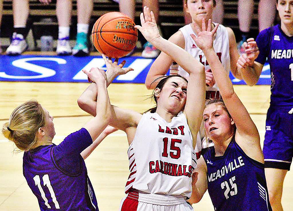 CHADWICK'S CHLOE BURKHART battles for a rebound against Meadville in the Class 1 State championship game Friday.