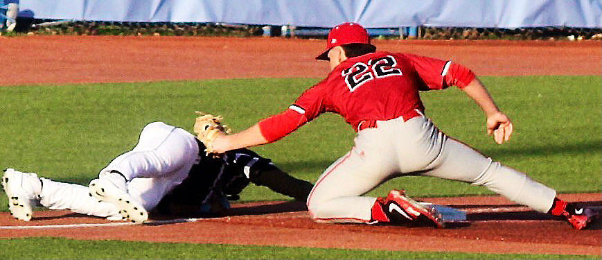 OZARK'S GAGE DEPEE tags out a baserunner.