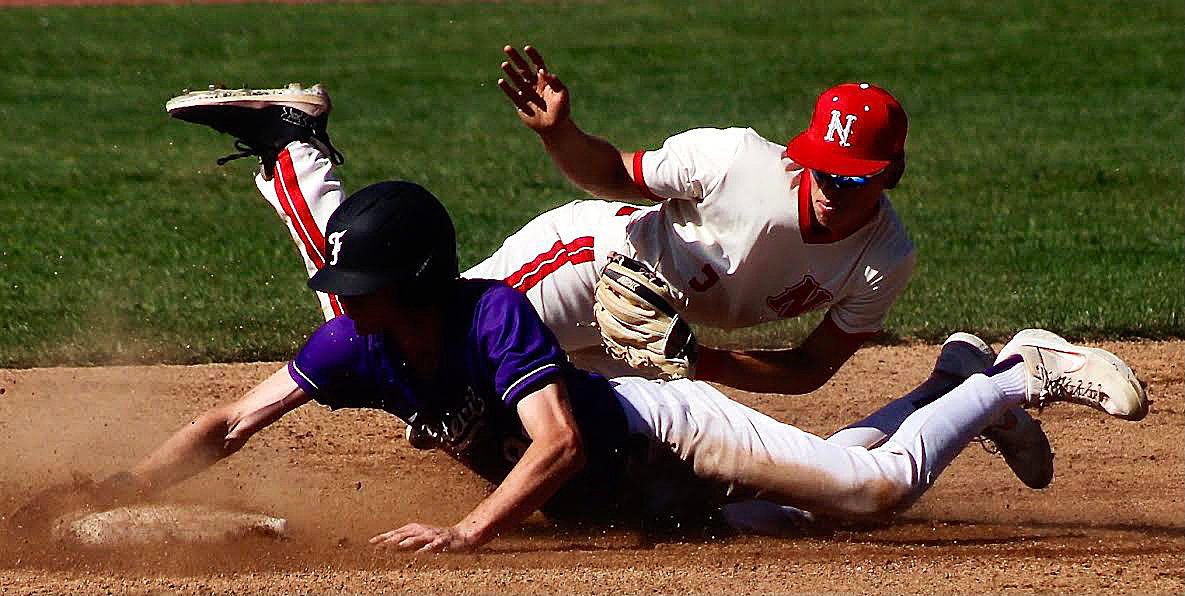NIXA'S CAEDEN CLOUD falls onto a Fayetteville runner after tagging him out in the teams' meeting Friday.