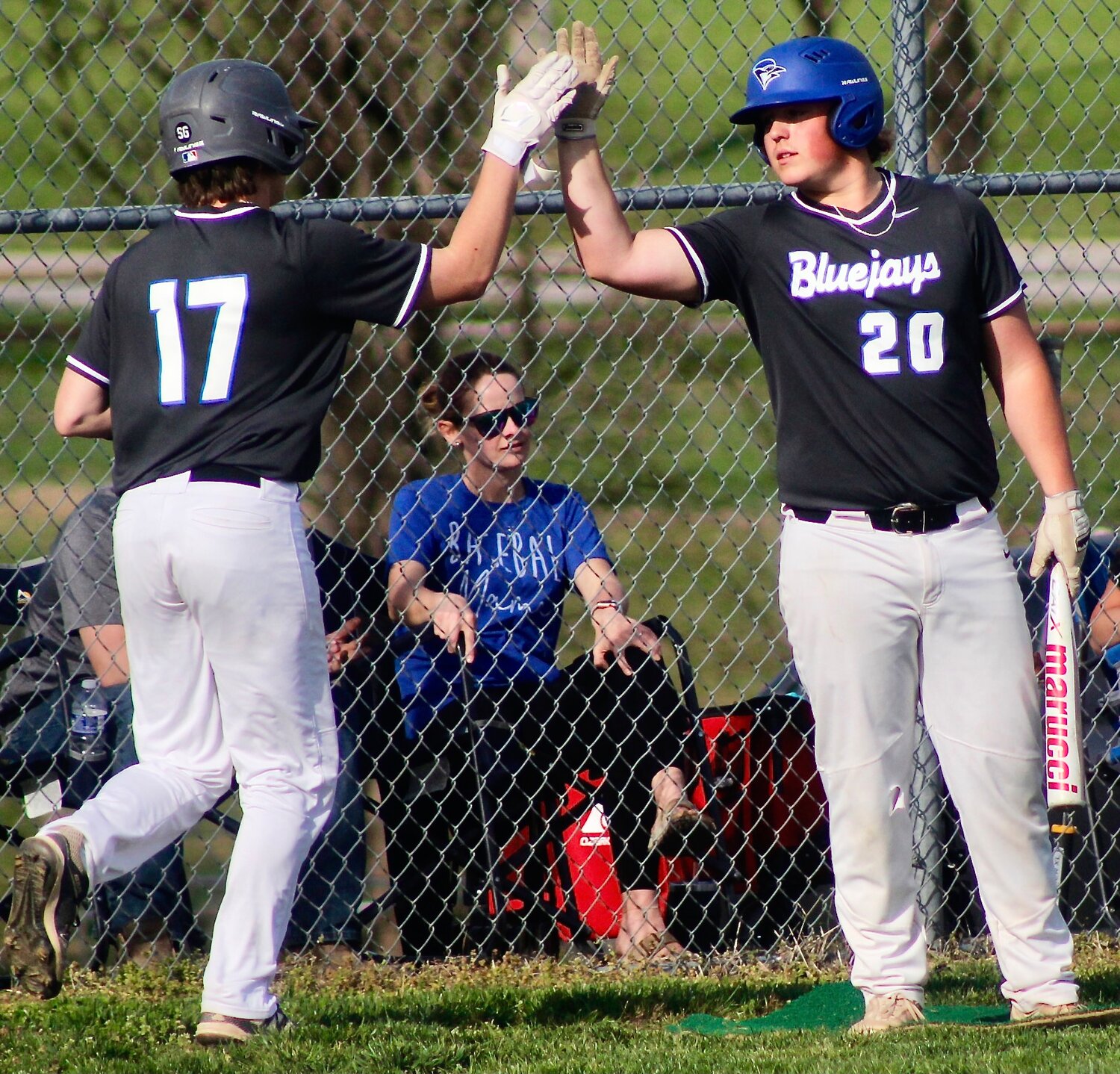 CLEVER'S CURTIS RUBLE AND TREVOR DEULEN exchange a high-five.
