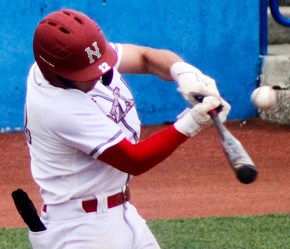 NIXA'S BRODEN MABE connects at-bat.