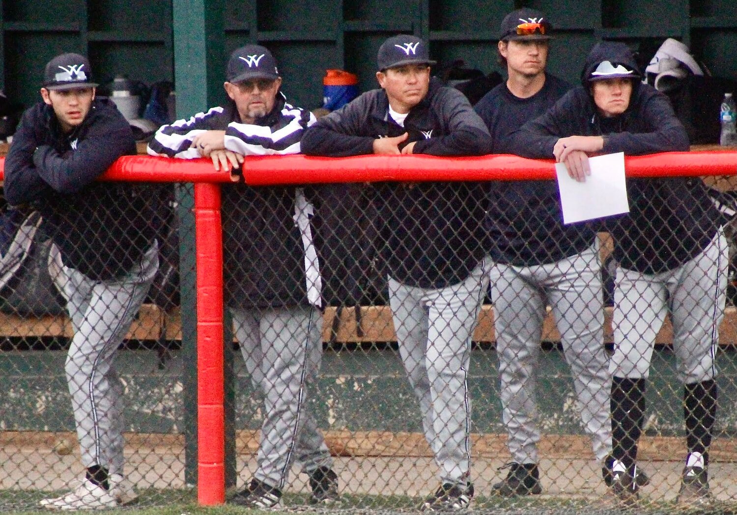 WILLARD COACH SCOTT MCGEE, middle, watches his Tigers compete against Ozark last week.