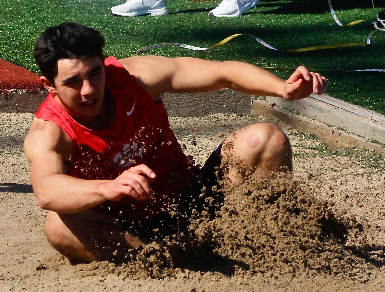 OZARK'S MICHAEL WESTOVER competes in the long jump.