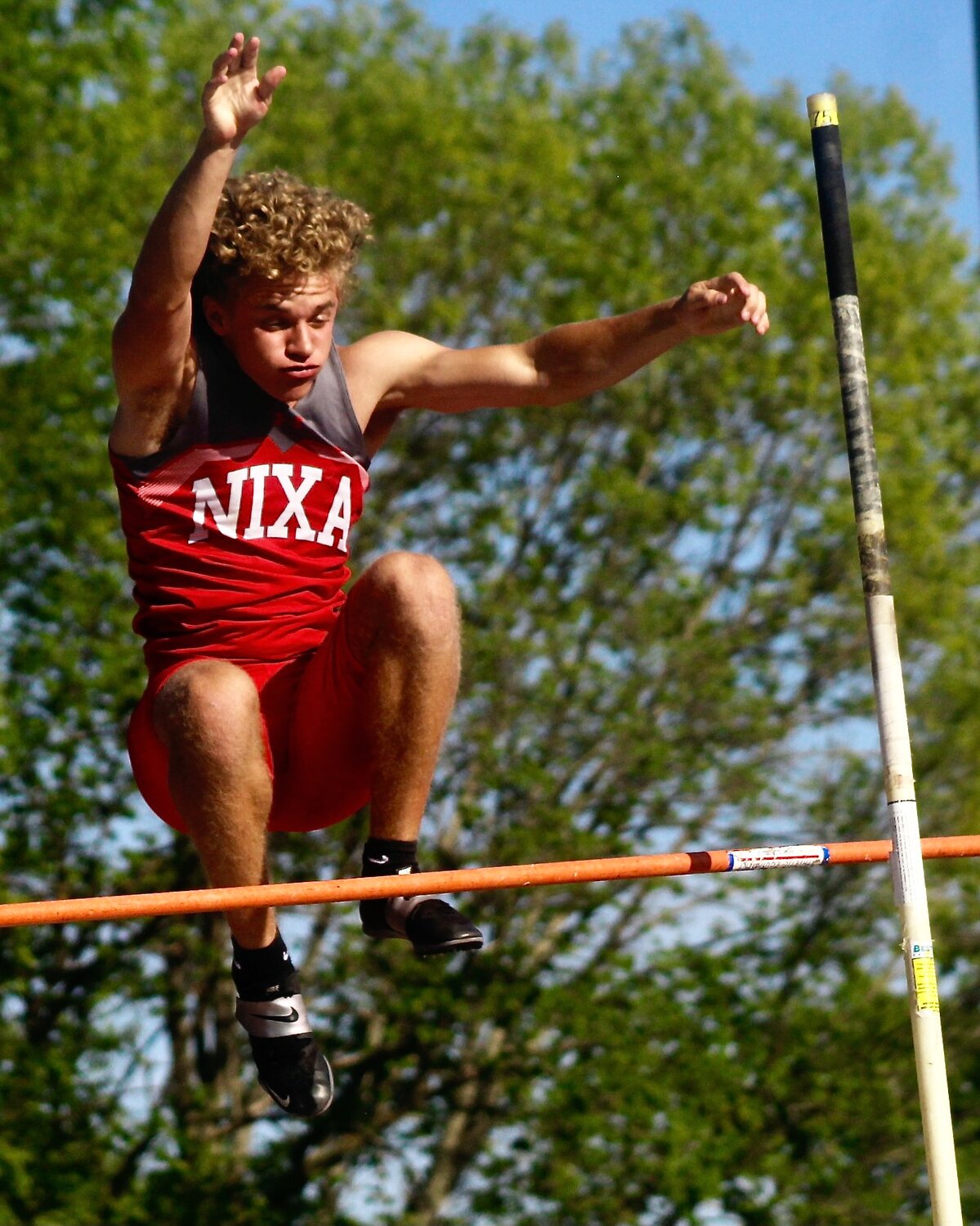 NIXA'S AFTON HOPKINS competes in the pole vault.
