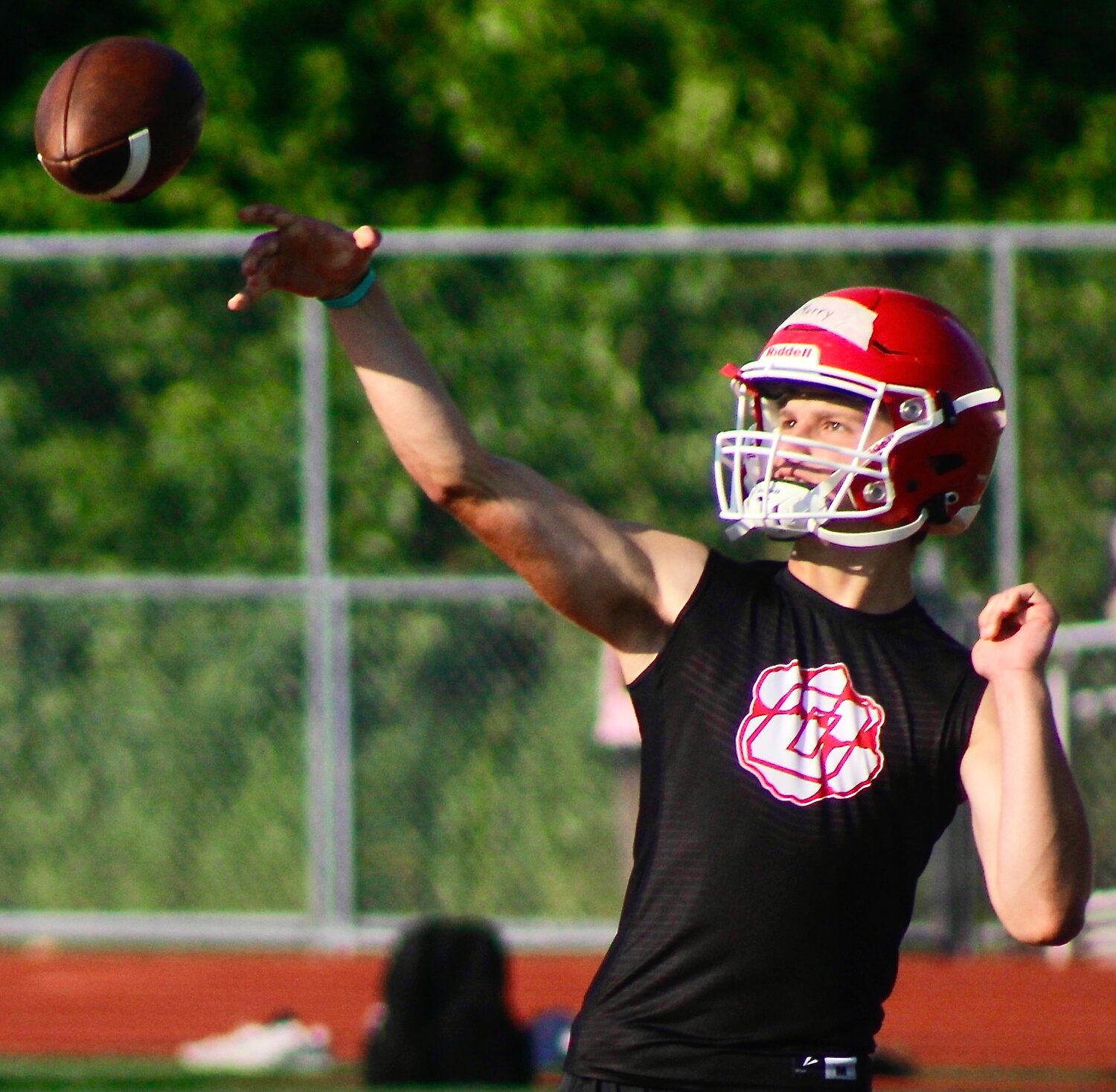 OZARK'S CONNOR MCMURRY fires a pass during 7-on-7 action.