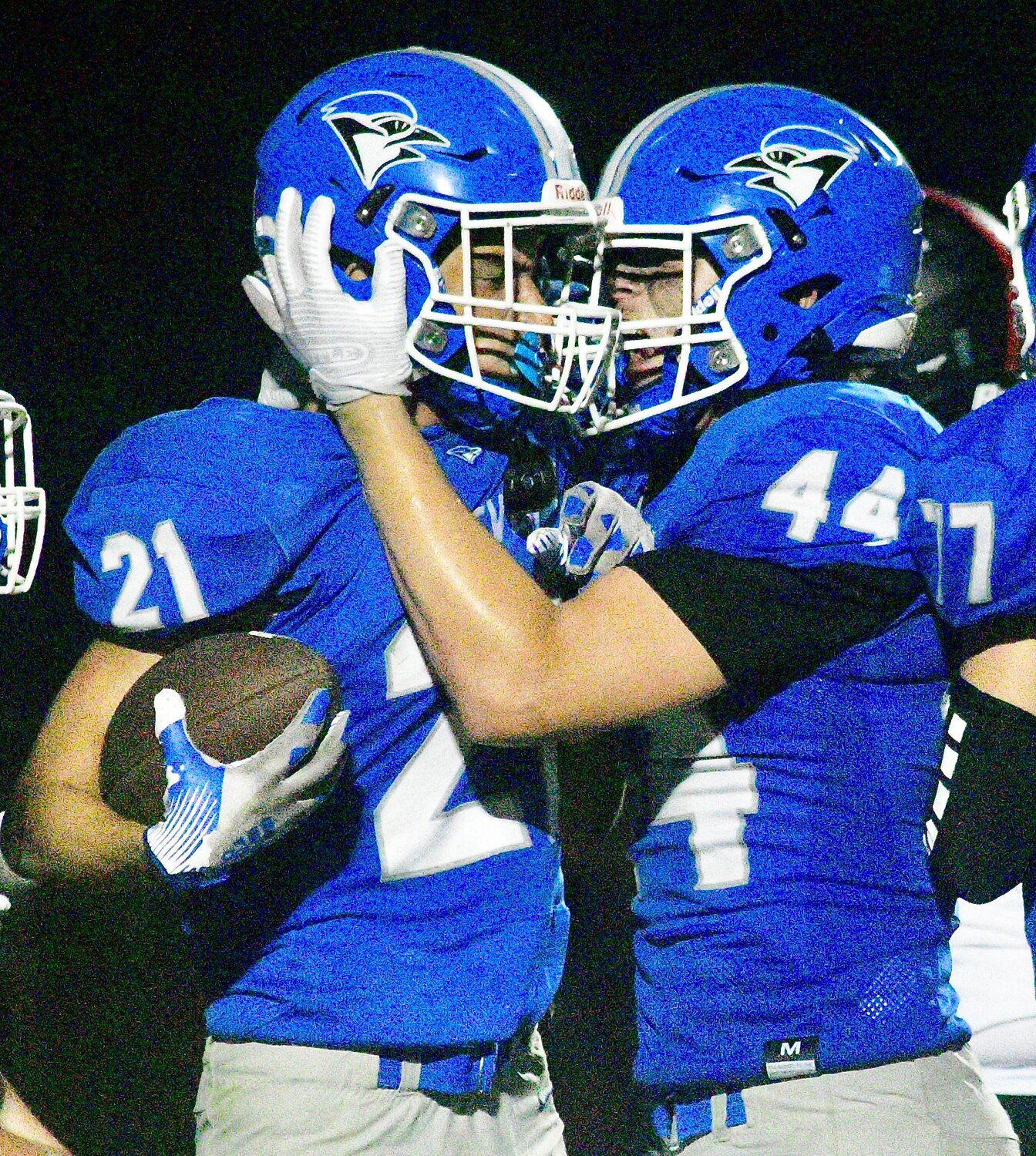 CLEVER'S XAVIER ROBINSON AND JACK WHITLINGER celebrate a touchdown.