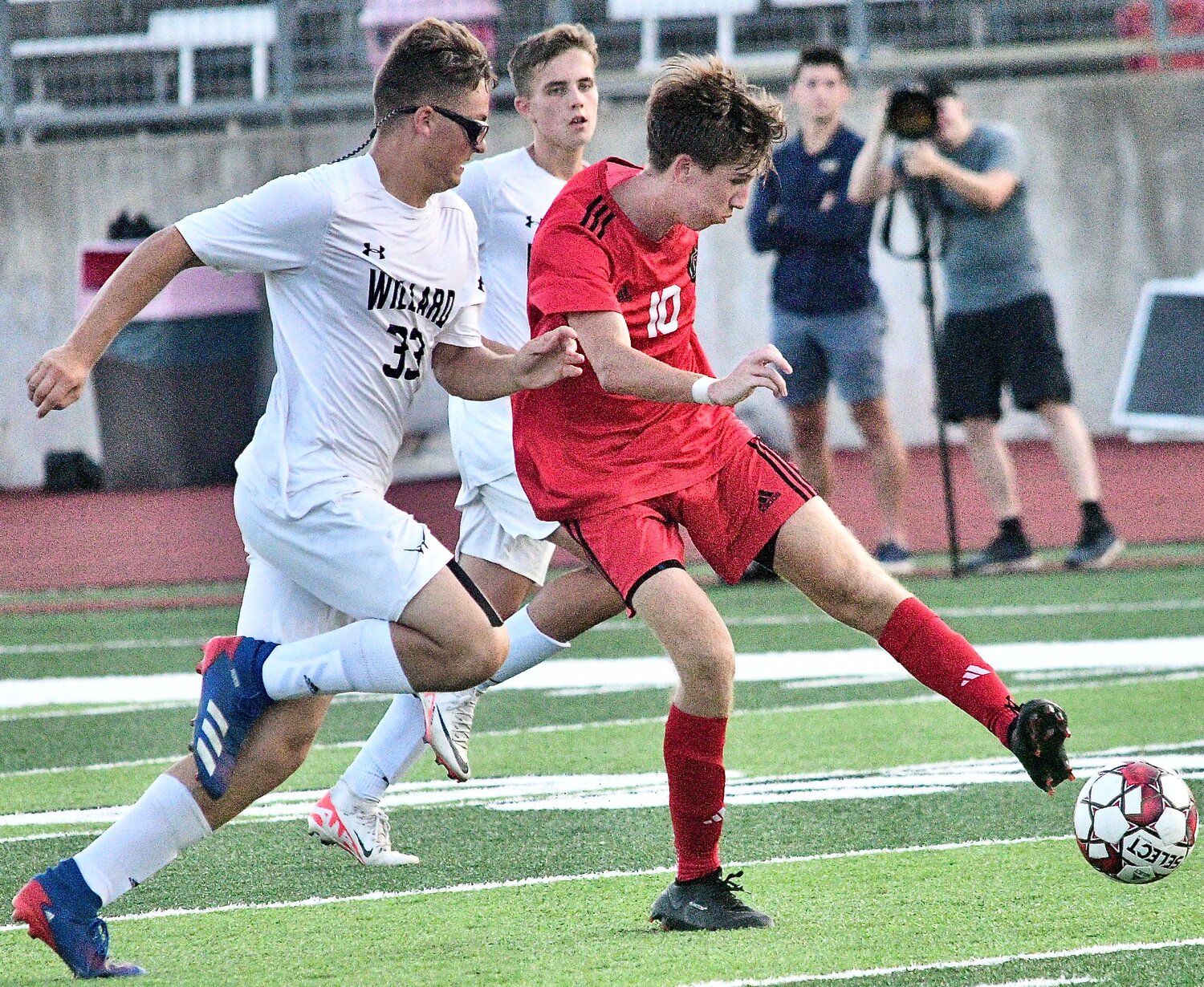 OZARK'S PHIN SCOTT connects for his second goal.