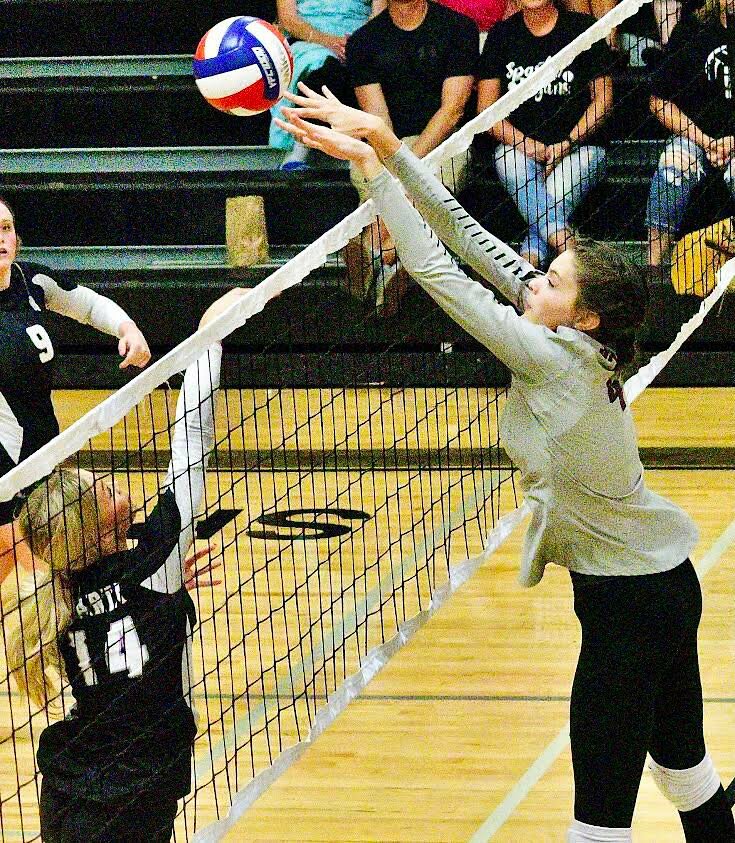 SPOKANE'S ANNA BRUNNER records a block against Sparta on Tuesday.