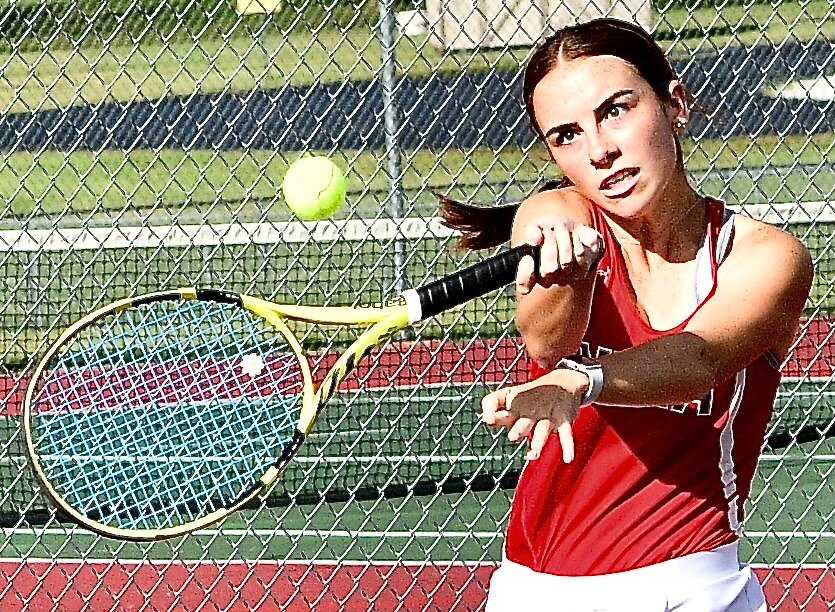 NIXA'S ABBY FULNECKY sets herself up for a forehand return.