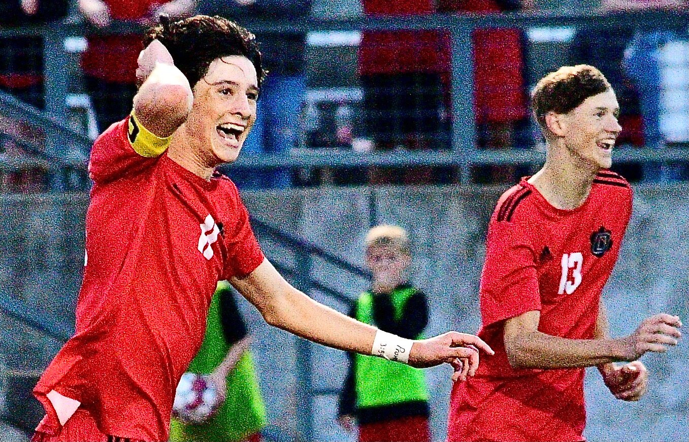 OZARK'S CALEB LEPANT AND GRANT OGLE are all smiles during the Tigers' 6-0 whipping of Kickapoo on Wednesday.