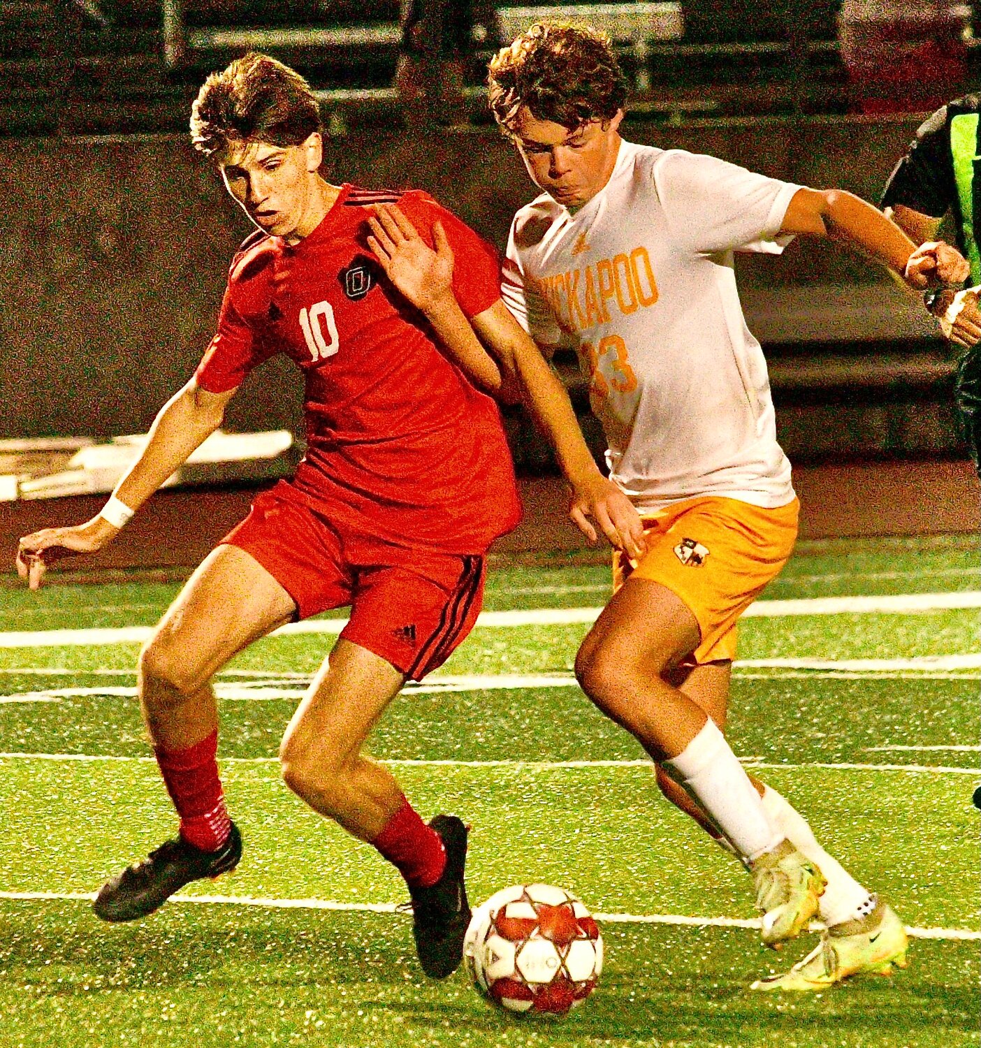 OZARK'S PHIN SCOTT fights for control of the ball.