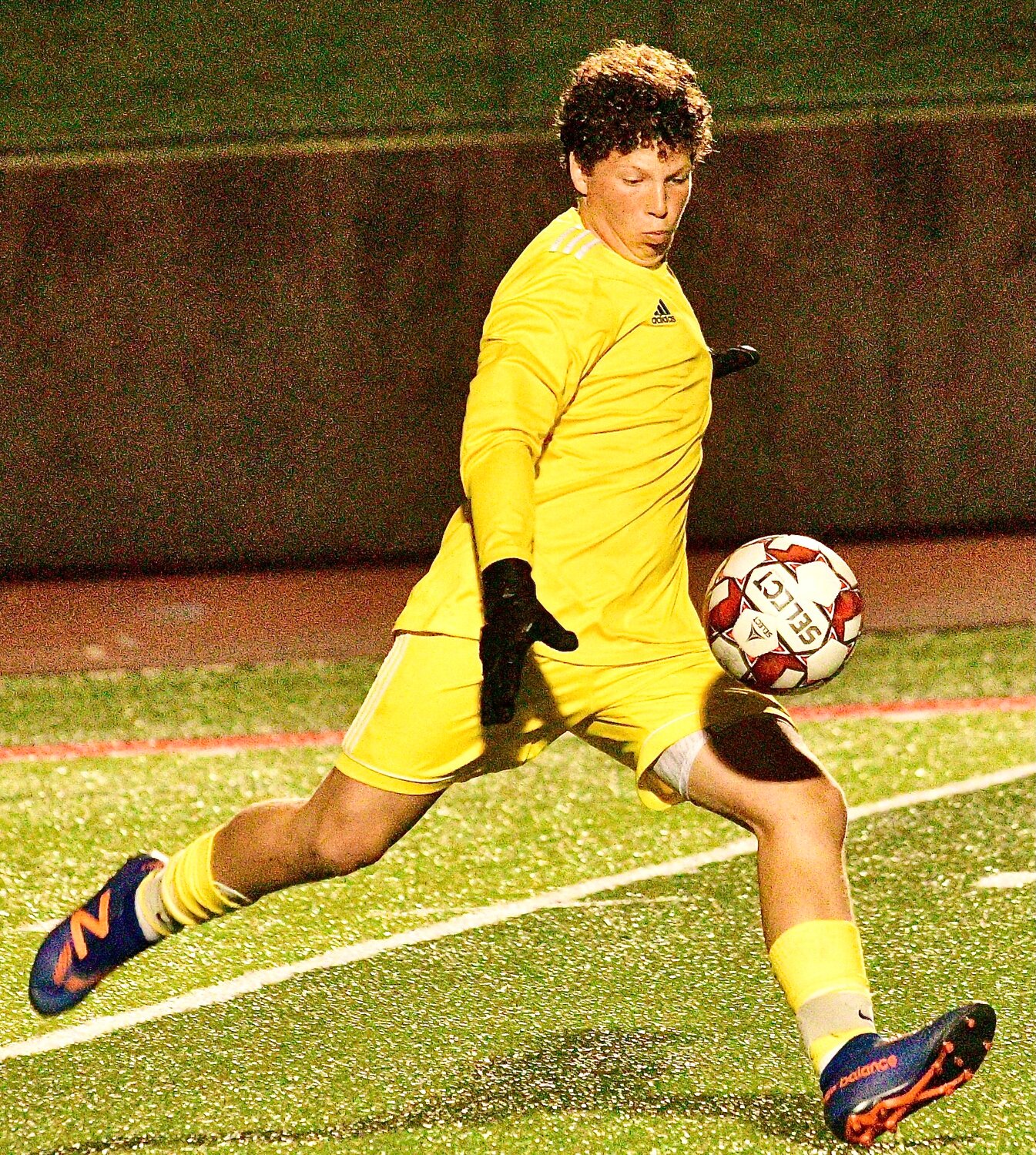 OZARK'S CARSON SANDGREN gets set to boot the ball downfield from his goalie position.