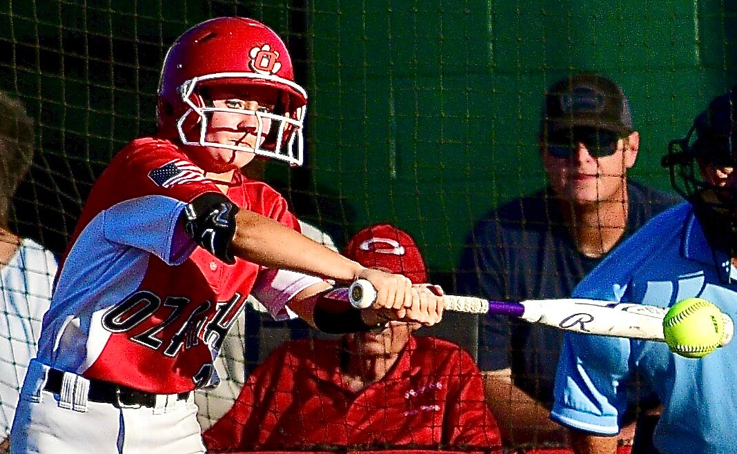 OZARK'S KENDALLL MCCOY connects with a pitch.