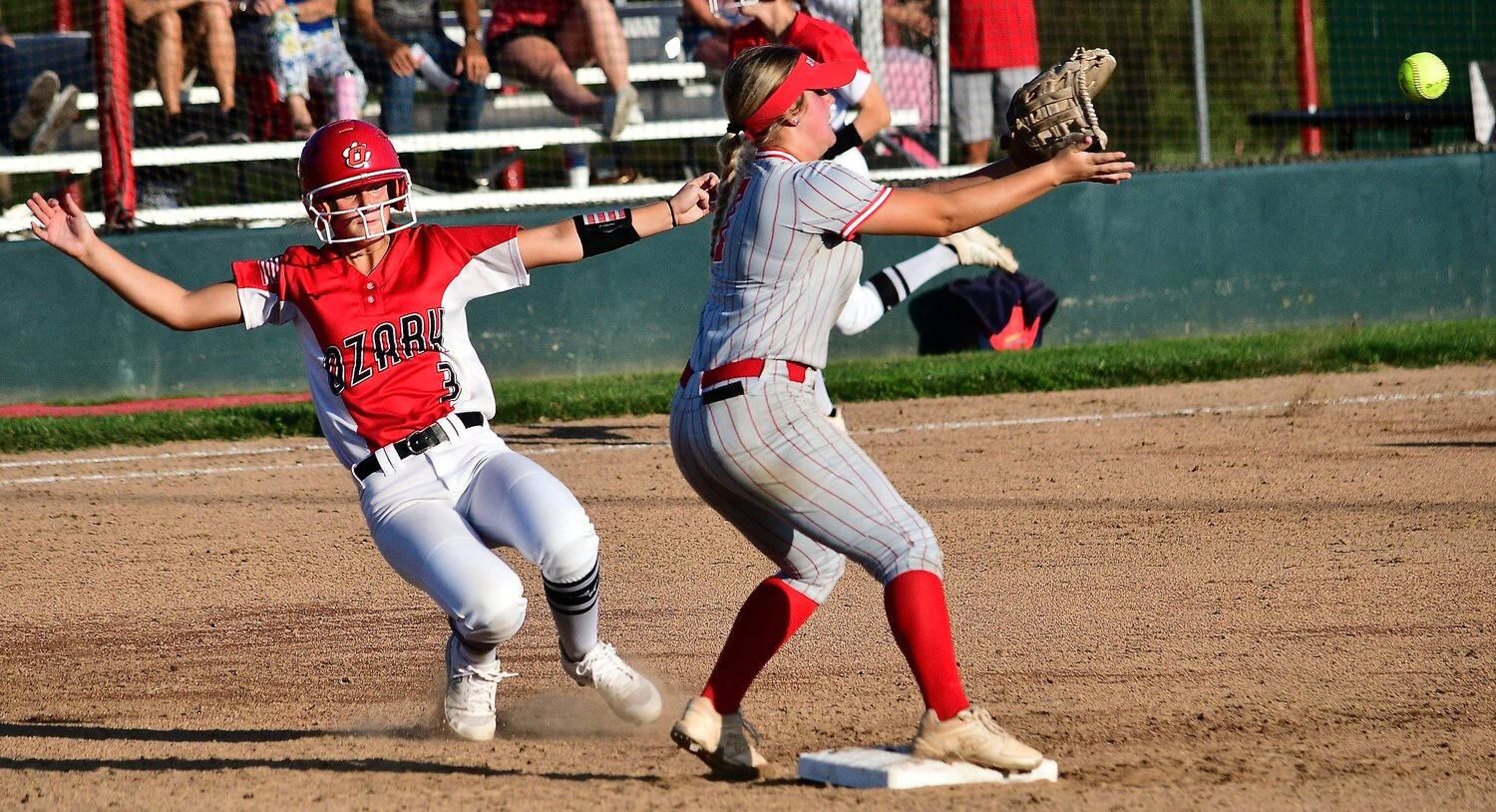 OZARK'S KELSEY BATIE isn't able to beat a throw to second on a forceout.