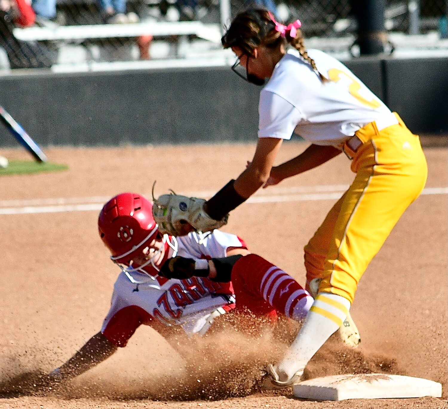 OZARK'S KAYLEE LINNEBUR is tagged out at second base.