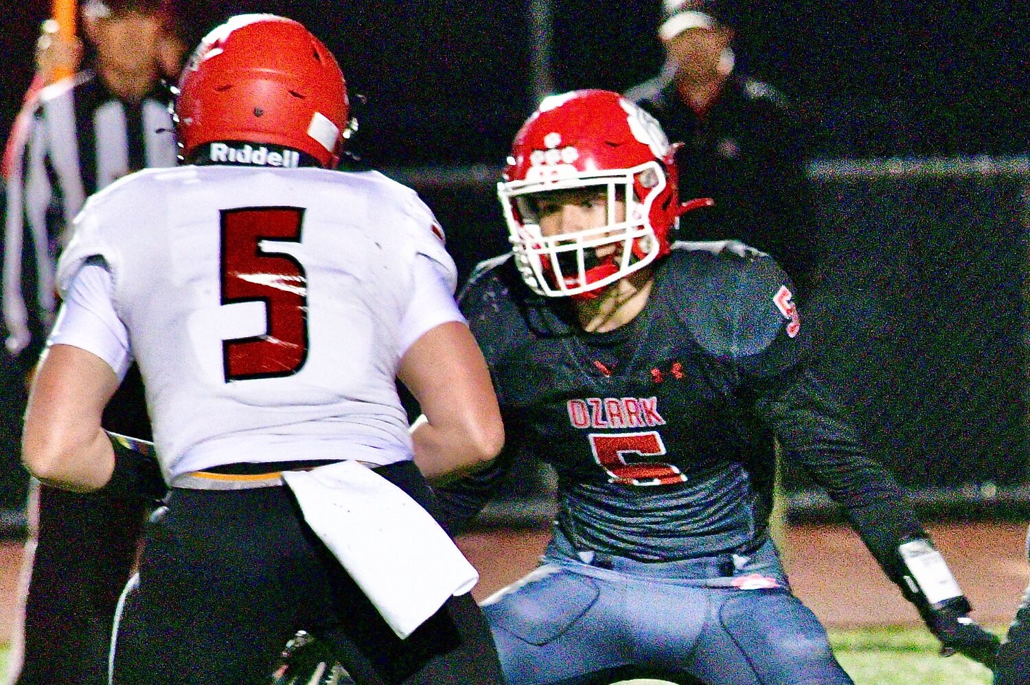 OZARK'S FRANKIE MUNOZ meets up with a Branson ball-carrier.
