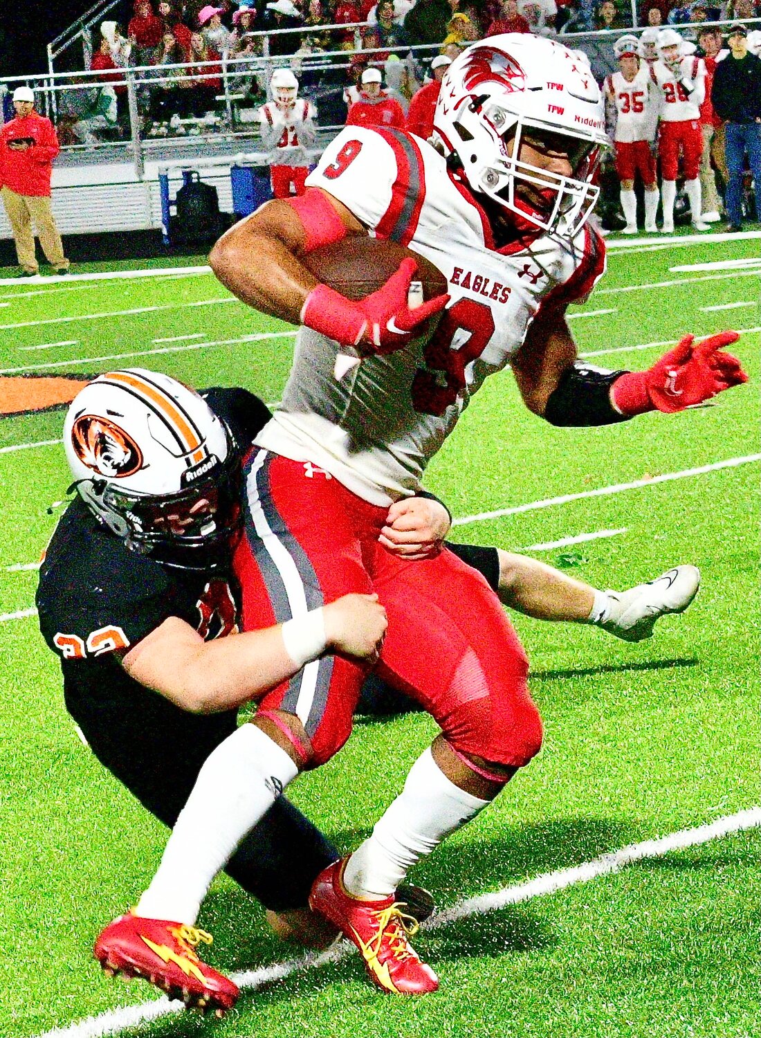 NIXA'S SPENCER WARD looks to shake free from a Republic defender.