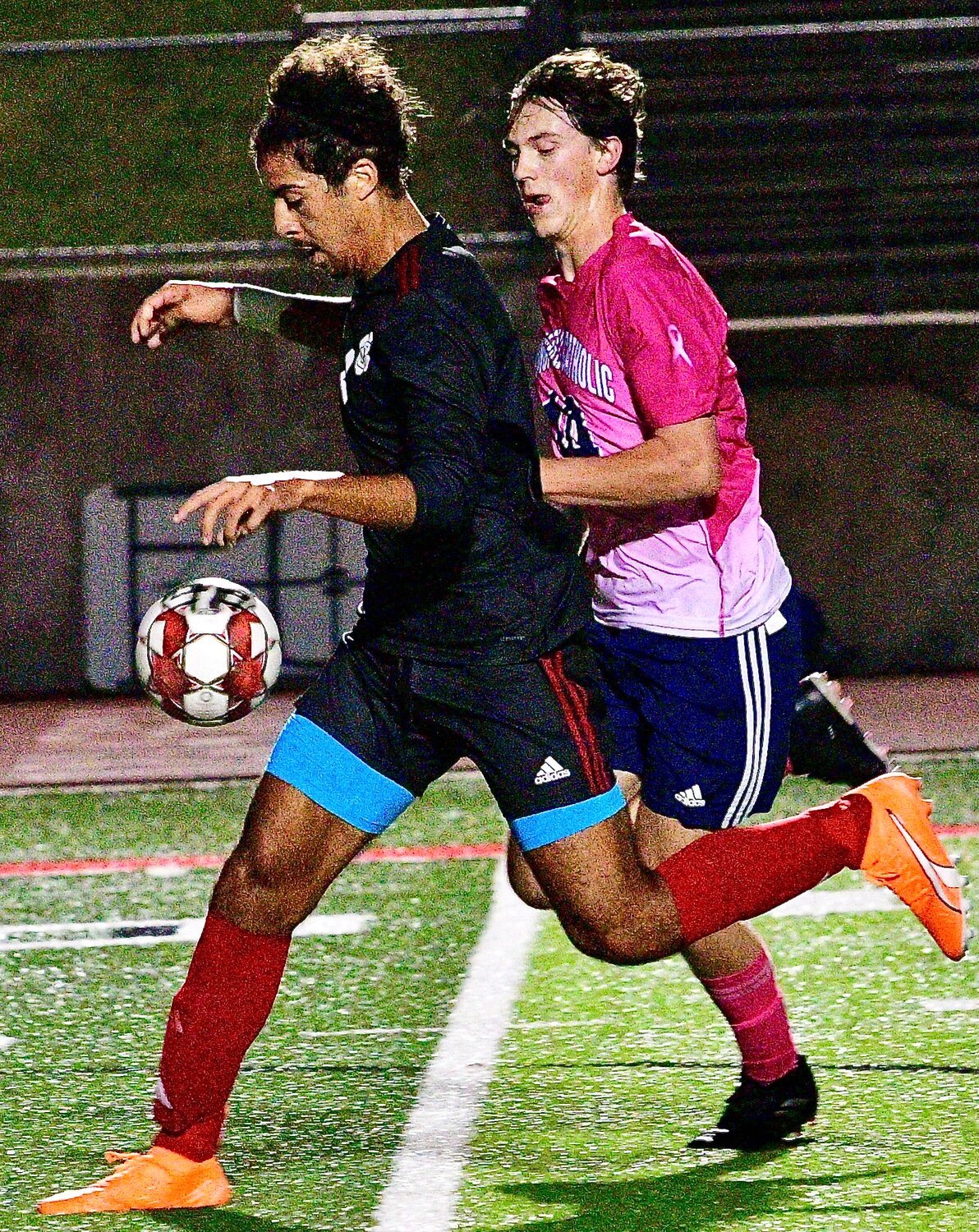 OZARK'S ALEX WILLIAMS races toward the Tigers' goal in control of the ball.