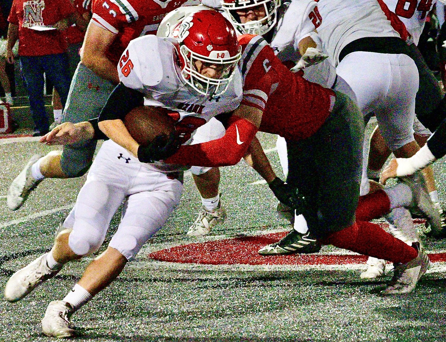 OZARK'S RORY BANKS secures the ball during a carry.
