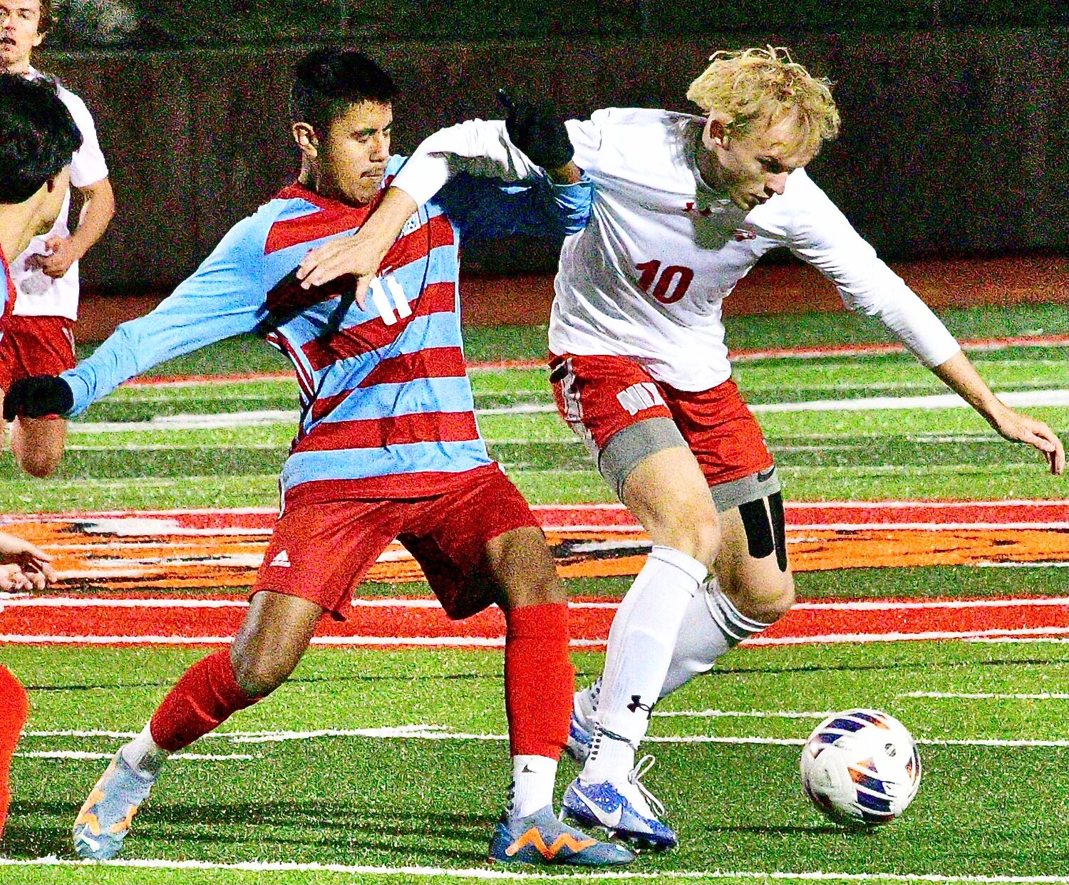 NIXA'S LUCAS GREEN fights for position.