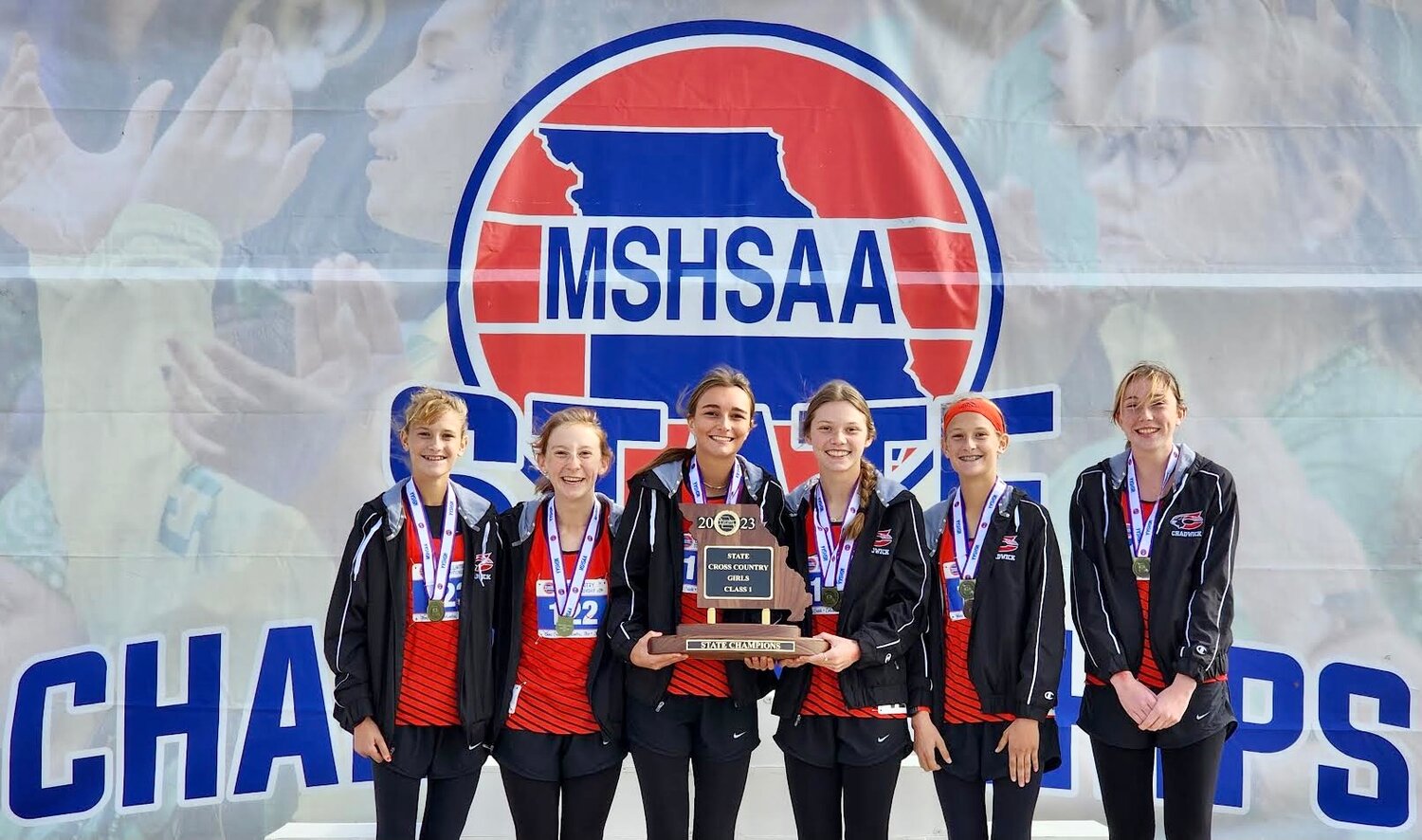 CHADWICK'S GIRLS CROSS COUNTRY TEAM (l-r) Emily Landry, Gretchen House, Lexi Loveland, Rae Little, Macy Landry and Maddy Sallee pose with their state championship trophy.